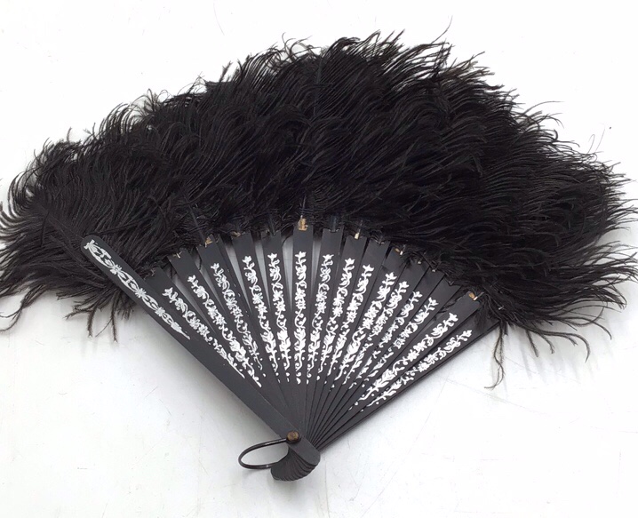 lot 215 image: Vintage Black Feather Folding Fan  White Painted Floral Design