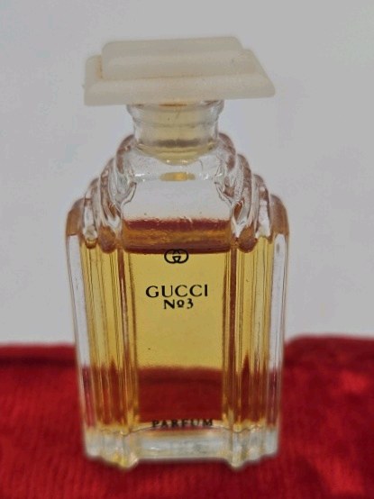 lot 217 image: Vintage Gucci No 3 Miniature Parfum Bottle