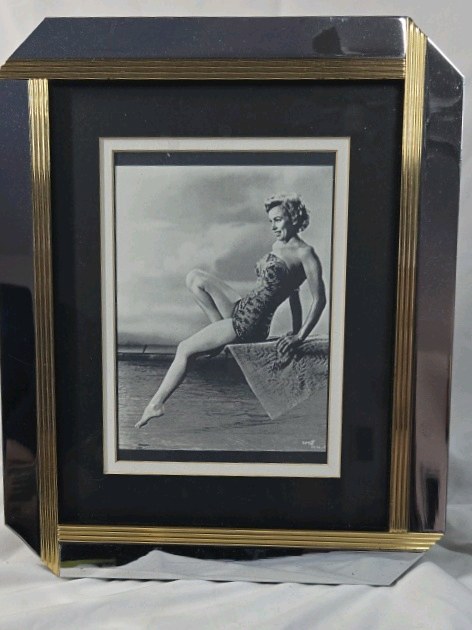 lot 227 image: Framed Marilyn Monroe Beach Photo Print  Black and Gold Frame