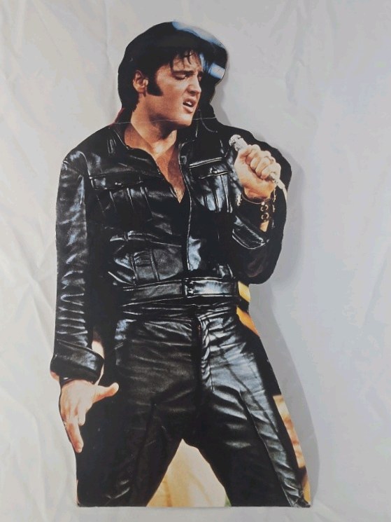 lot 246 image: Vintage Elvis Presley Standee  Black Leather Jumpsuit Performance Pose