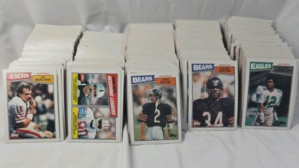 lot 257 image: 1987 Topps Football Cards Lot  NFL Stars Including Montana Payton Flutie Cunningham