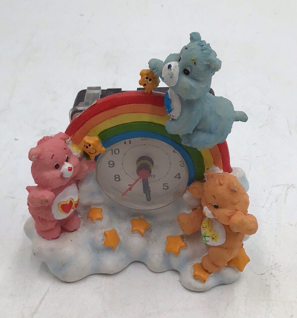 lot 46 image: Vintage Care Bears Clock Figurine  Rainbow Cloud with Bears