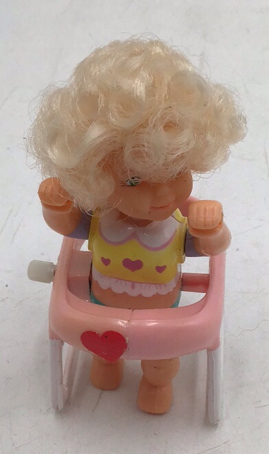 lot 50 image: Vintage Care Bears Wind-Up Toy  Blonde Baby in Walker