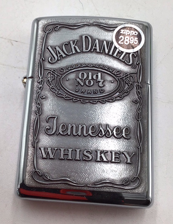 lot 8 image: Vintage Zippo Lighter  Jack Daniels Old No. 7 Tennessee Whiskey with Tin and Papers
