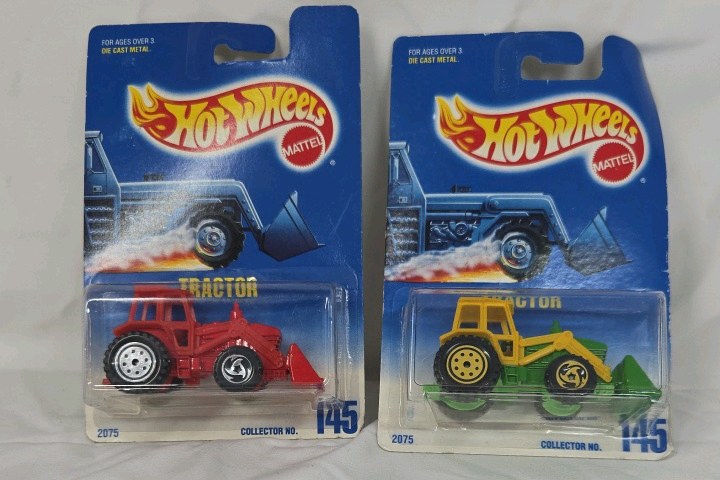 lot 89 image: New in Package Vintage Hot Wheels Tractor  Red and Yellow Diecast Models on Original Blister Cards