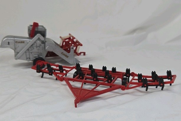 lot 93 image: Vintage Case Combine Harvester Toy