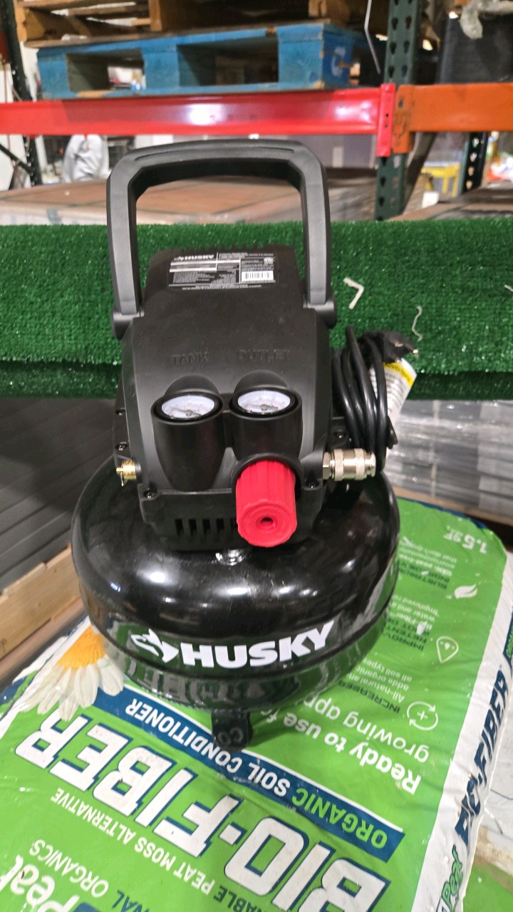 lot 113 image: Husky 3 Gal. 120 PSI Portable Electric Oil-Free Light Duty Pancake Air Compressor with Fold Down Handle and 1-Quick Coupler