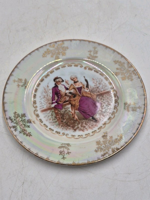 lot 118 image: Vintage Porcelain Plate  Iridescent Glaze with Rococo Couple Scene Daniels Japan