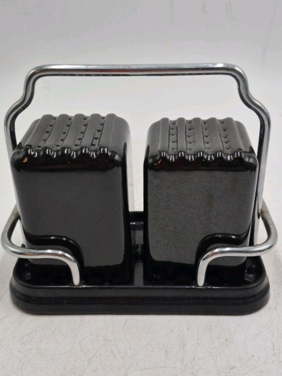lot 121 image: Vintage Black Ceramic Salt and Pepper Shakers with Chrome Caddy
