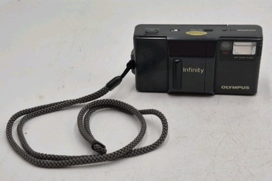 lot 147 image: Vintage Olympus Infinity Point-and-Shoot Camera