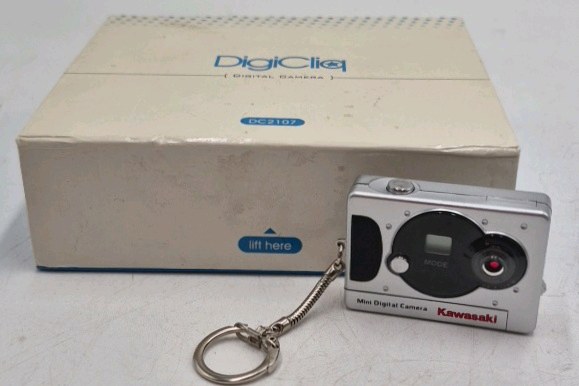 lot 149 image: Vintage DigiCliq Mini Digital Camera Keychain