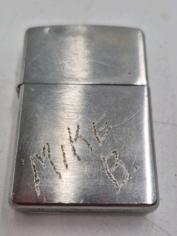 lot 163 image: Vintage Zippo Lighter  Engraved Mike B. with 2009 Date Code