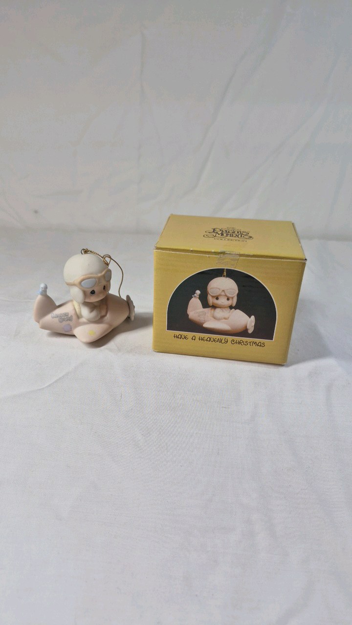 lot 195 image: 1984 Precious Moments Ornament  Have a Heavenly Christmas Airplane Pilot