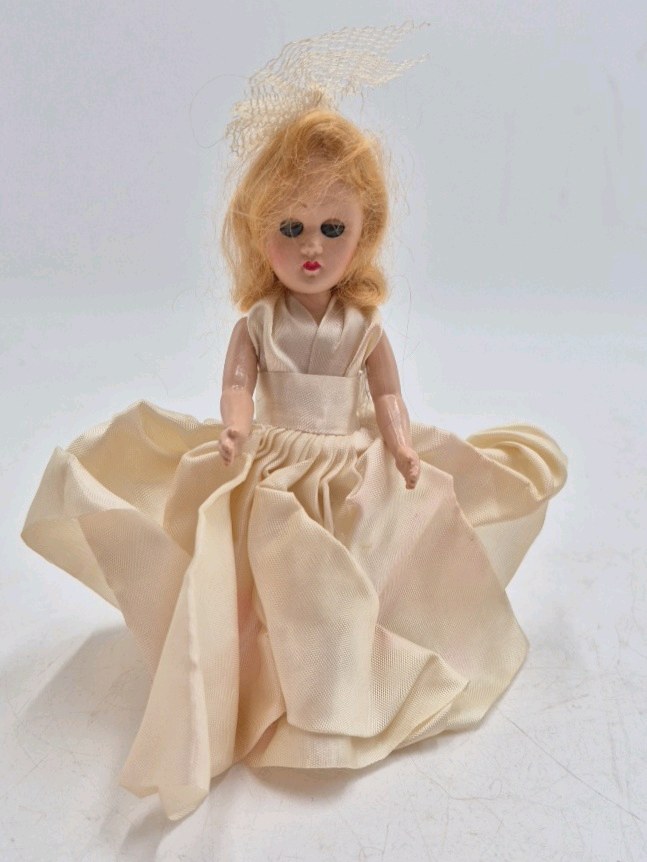 lot 239 image: Vintage  Bride Doll  Ivory Full Skirt Gown