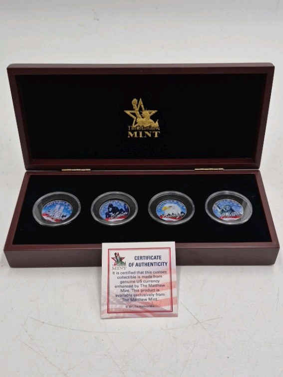 lot 32 image: The Matthew Mint 911 10th Anniversary Tribute Set  4 Colorized Coins in Display Box