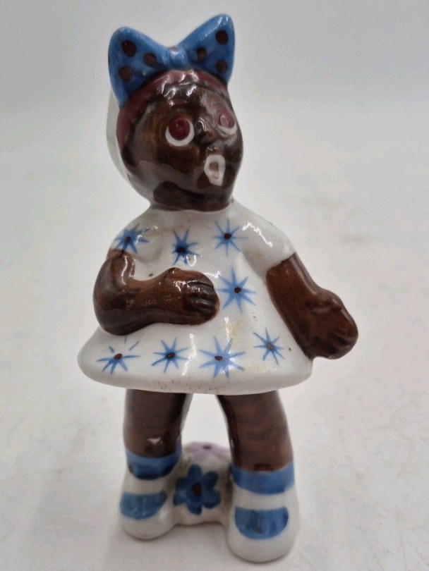 lot 36 image: Vintage Ceramic Black Americana Figurine  Girl with Bow in Polka Dot Dress