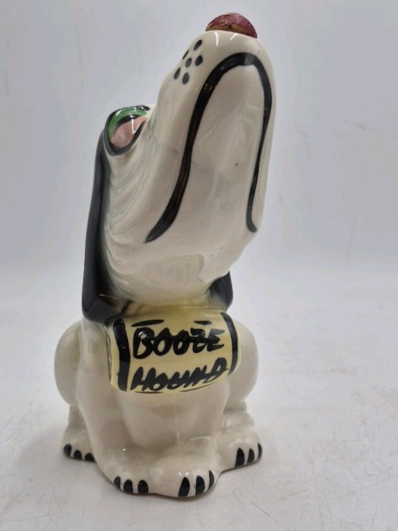 lot 37 image: Vintage Ceramic Booze Hound Dog Figurine  Howling Basset with Barrel