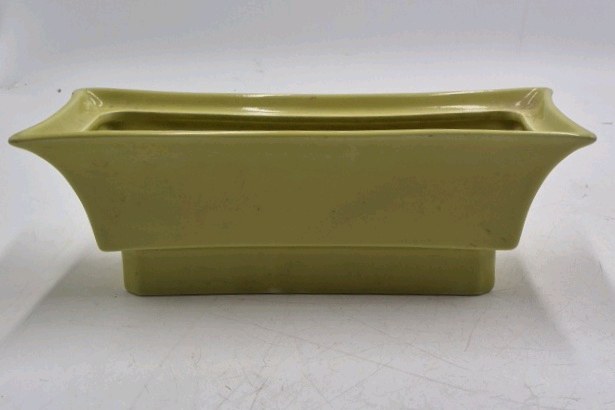 lot 46 image: Vintage Jacquelin Ceramic Planter  Olive Green Glaze with Flared Rectangular Form