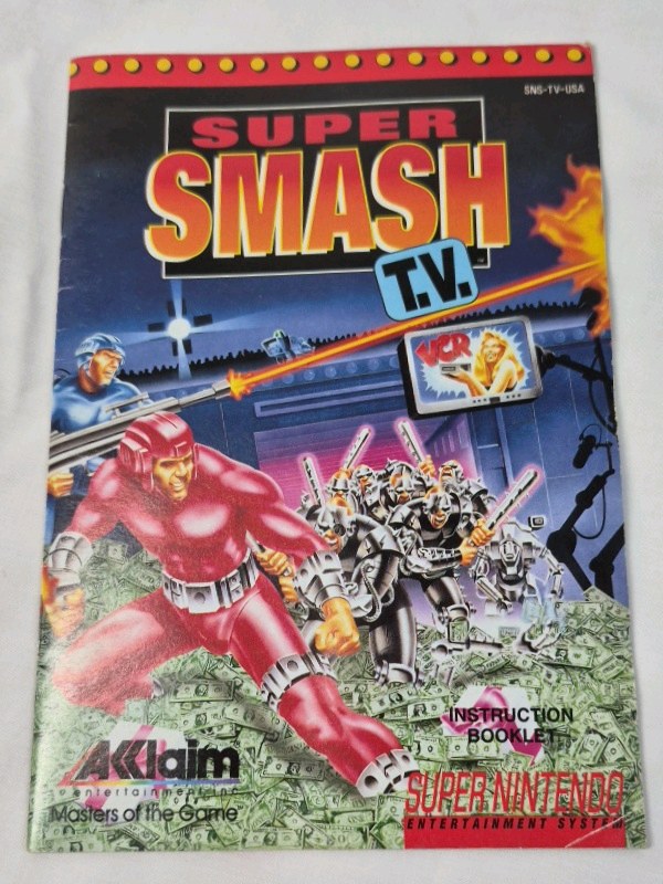 lot 53 image: Vintage Super Nintendo Super Smash T.V. Instruction Booklet