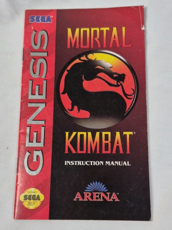 lot 54 image: Vintage Sega Genesis Mortal Kombat Instruction Manual