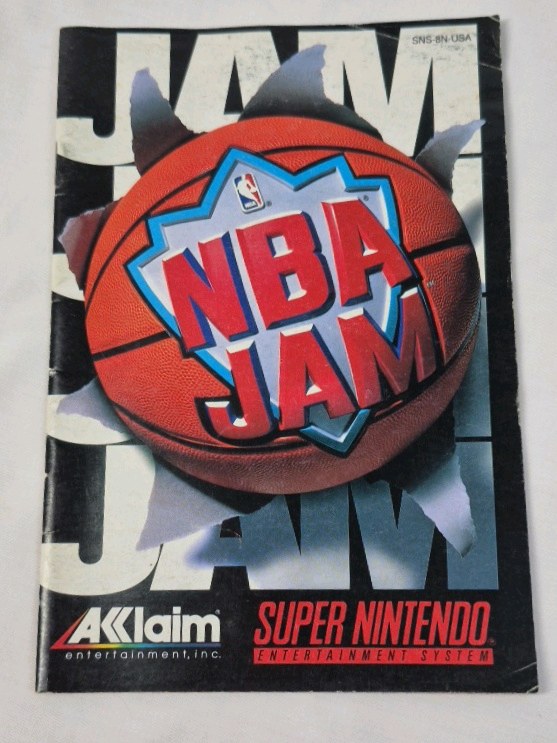 lot 56 image: Vintage Super Nintendo NBA Jam Instruction Booklet