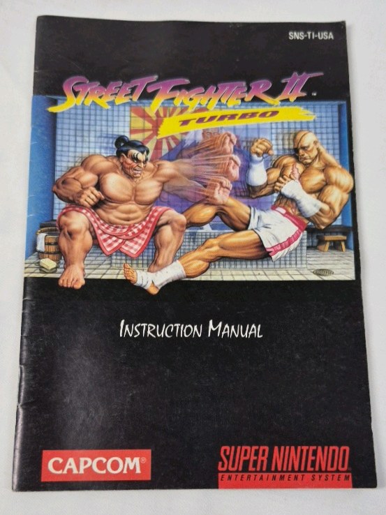 lot 58 image: Vintage Super Nintendo Street Fighter II Turbo Manual  SNS-T1-USA Capcom