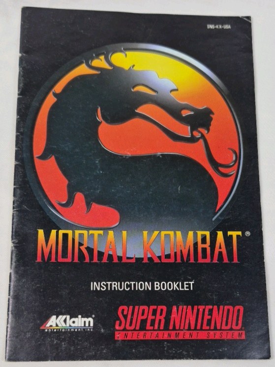 lot 61 image: Vintage Super Nintendo Mortal Kombat Instruction Booklet