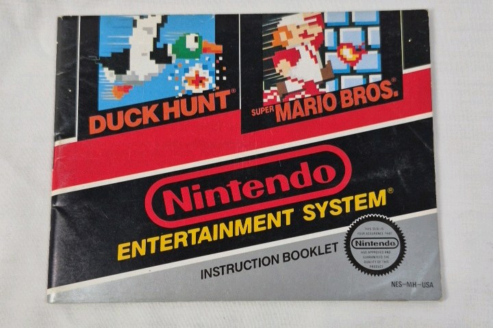 lot 64 image: Vintage NES Duck Hunt  Super Mario Bros. Instruction Booklet