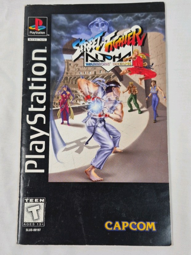 lot 66 image: Vintage PlayStation Street Fighter Alpha Instruction Booklet  Capcom