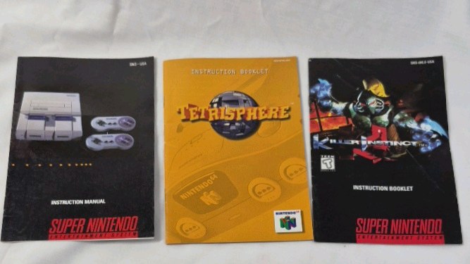 lot 73 image: Vintage Nintendo 64 Instruction Booklet  Nintendo