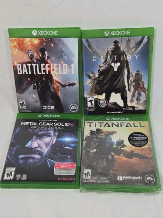 lot 88 image: Xbox One Video Games Lot  Battlefield 1, Destiny, Metal Gear Solid V Ground Zeroes, Titanfall