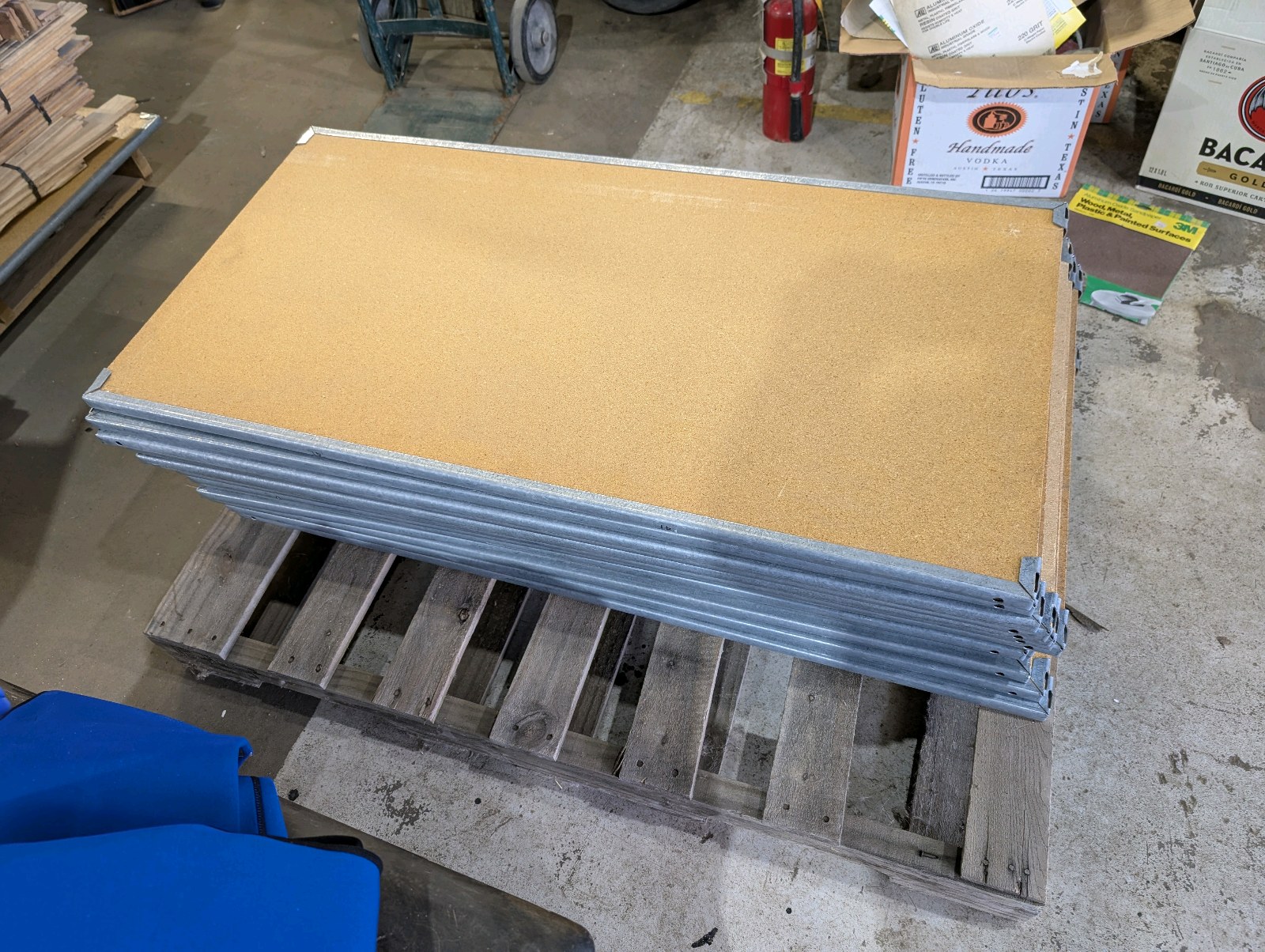 lot 11 image: Lot of 16 Heavy-Duty Retail Gondola Shelves  24x46 Particle Board w Metal Edging  Store Fixtures