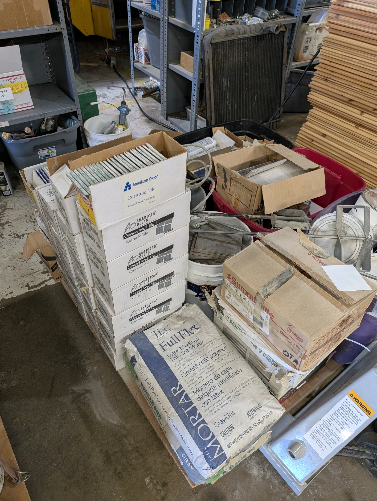 lot 6 image: Large Pallet of Ceramic & Porcelain Tile, Trim Pieces, MortarAdhesives  Mixing Drill & 3 Paddle Mixers  American Olean, Italian Tile