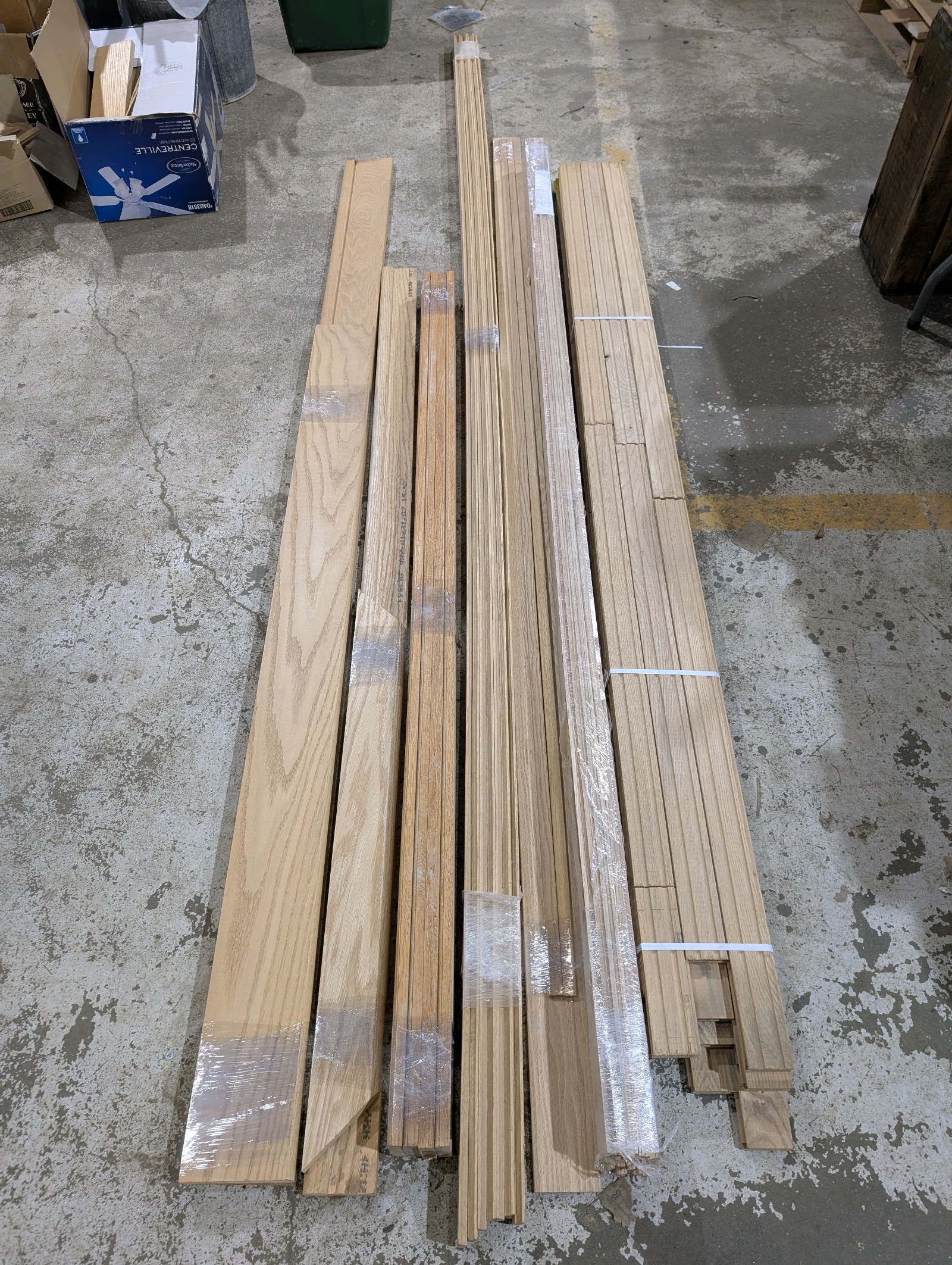 lot 67 image: Large Oak Trim & Flooring Lot  Stair Treads, 11 Casing, Prefinished Base, Hardwood Flooring & 50 Oak Trim Strips