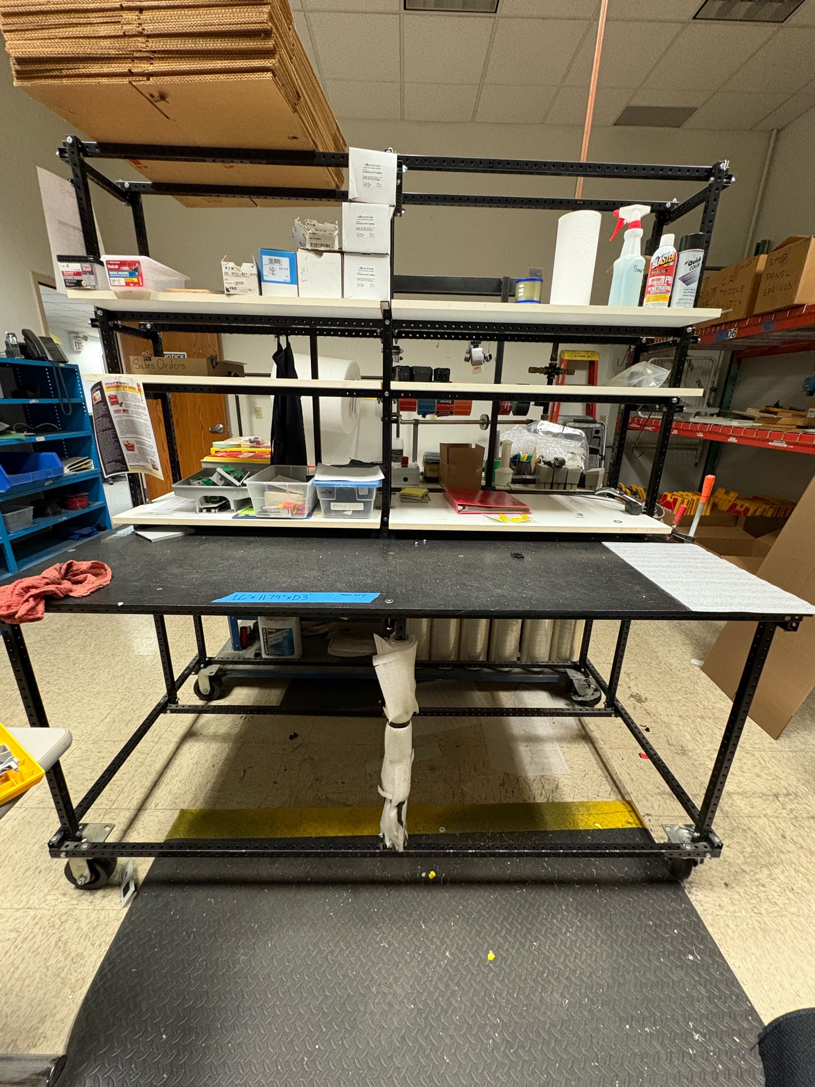 Mobile work station with shelves attached