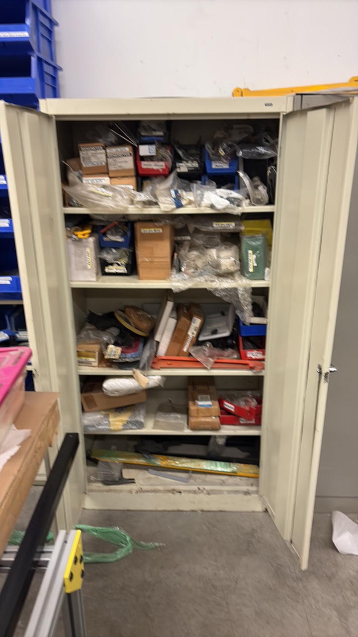 TENNSCO  2-door metal storage cabinet with contents