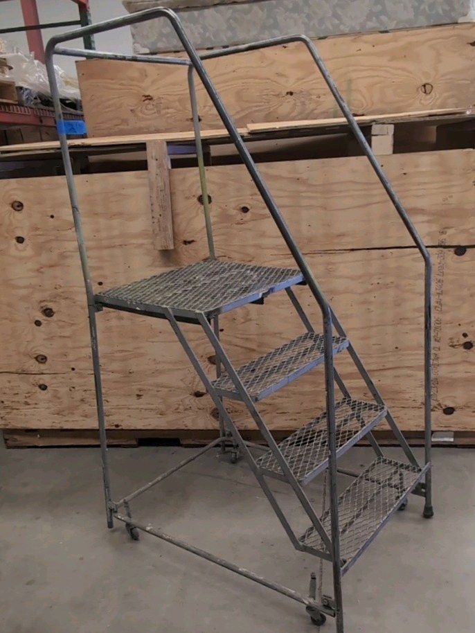 Warehouse rolling ladder
