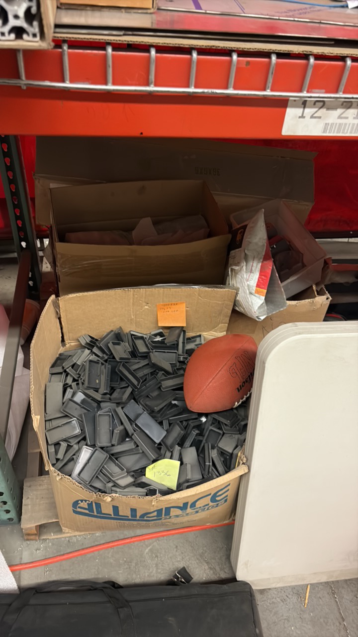 shelves with hardware, hoses, and cords