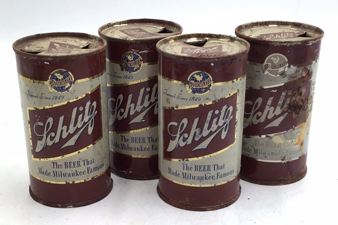 lot 131 image: Vintage Schlitz Beer Coin Bank Cans  1950s  The Beer That Made Milwaukee Famous