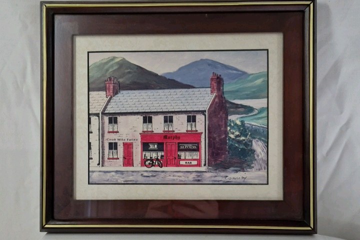 lot 18 image: Framed Print  Irish Pub Murphys with Bicycle and Guinness Sign