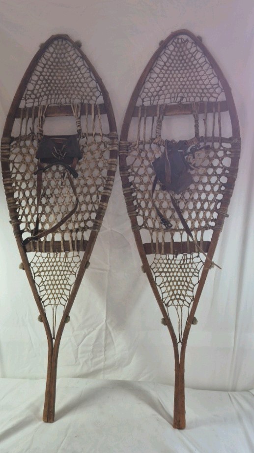 lot 2 image: Vintage Wooden Snowshoes  Teardrop Shape with Leather Bindings