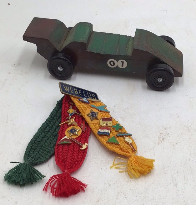 lot 222 image: Vintage Webelos Pinewood Derby Car with Braided Neckerchief and Pins