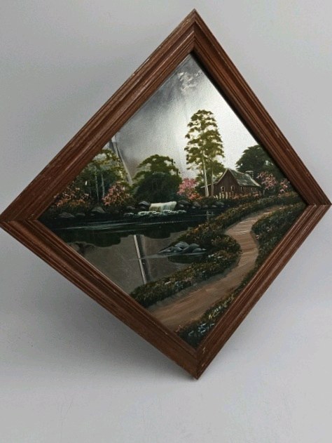 lot 26 image: Diamond-Shaped Framed Painted Mirror  Signed K. Cumes
