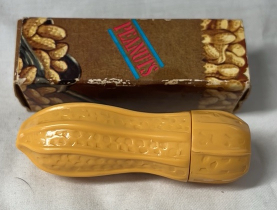 lot 326 image: Vintage Peanuts Lip Balm Container