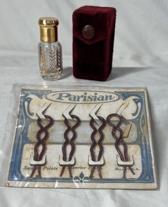 lot 327 image: Parisian Hair Barrettes with Perfume Bottle