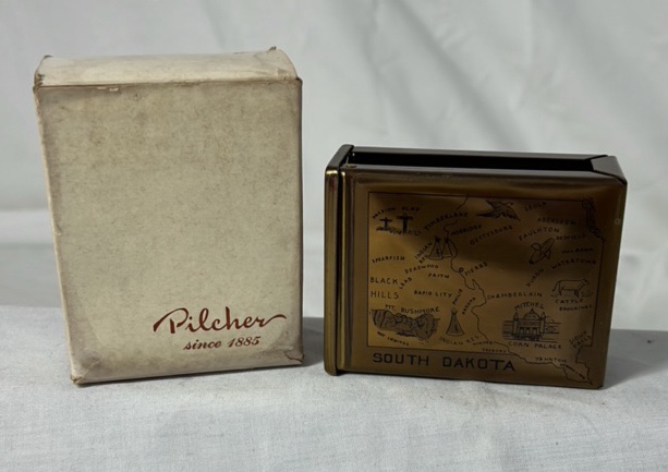 lot 328 image: Pilcher South Dakota Souvenir Cigarette Cover