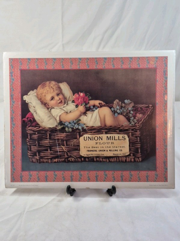 lot 56 image: Vintage Advertising Print  Union Mills Flour Baby in Basket