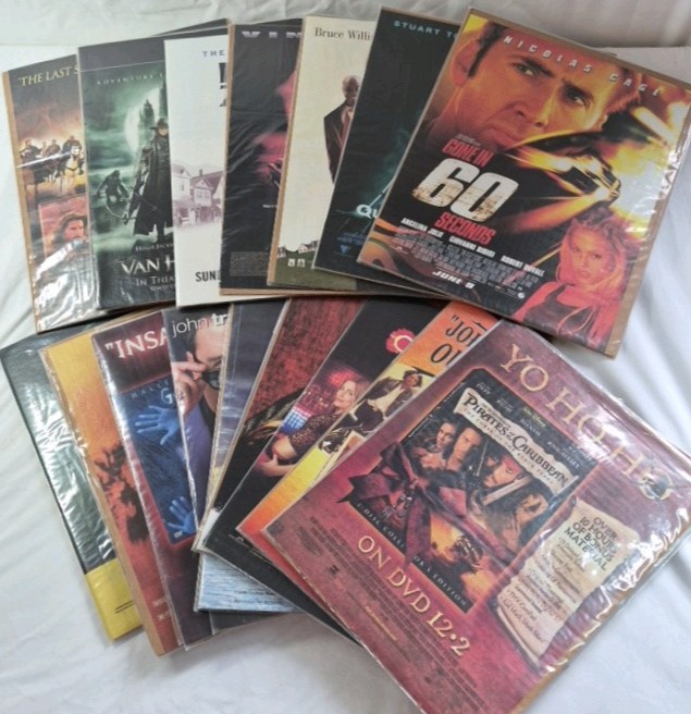 lot 61 image: Collection of Vintage DVD Movie ads  Action and Adventure Titles