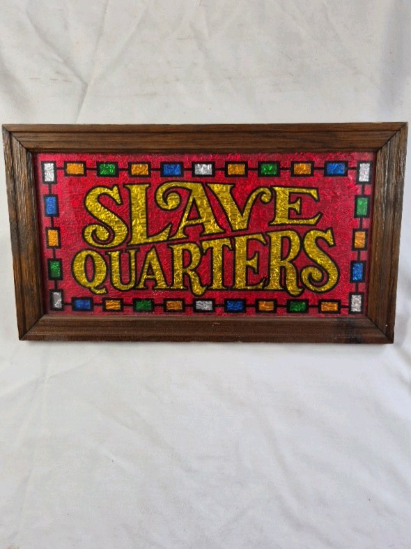 lot 62 image: Framed Folk Art Sign  Slave Quarters Text with Stained Glass Border