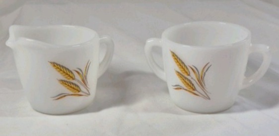 lot 74 image: Vintage Fire King Milk Glass Creamer and Sugar  Golden Wheat Pattern
